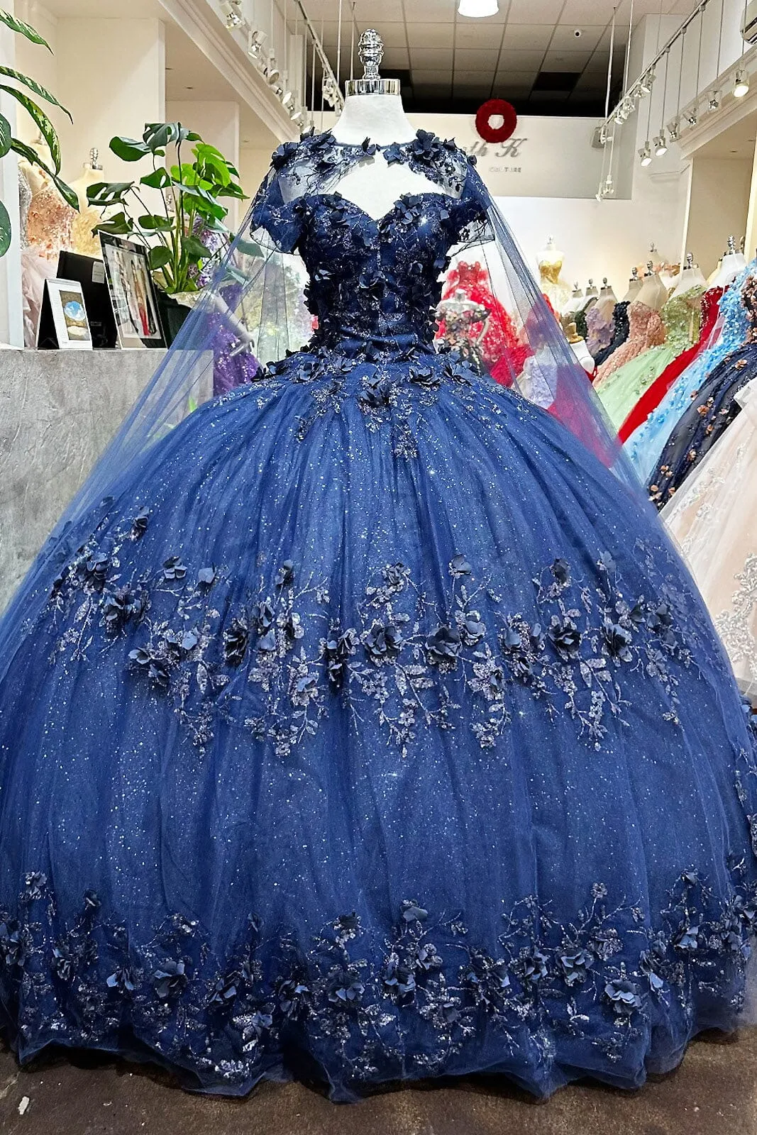 3D Floral Off Shoulder Cape Ball Gown by Elizabeth K GL3179